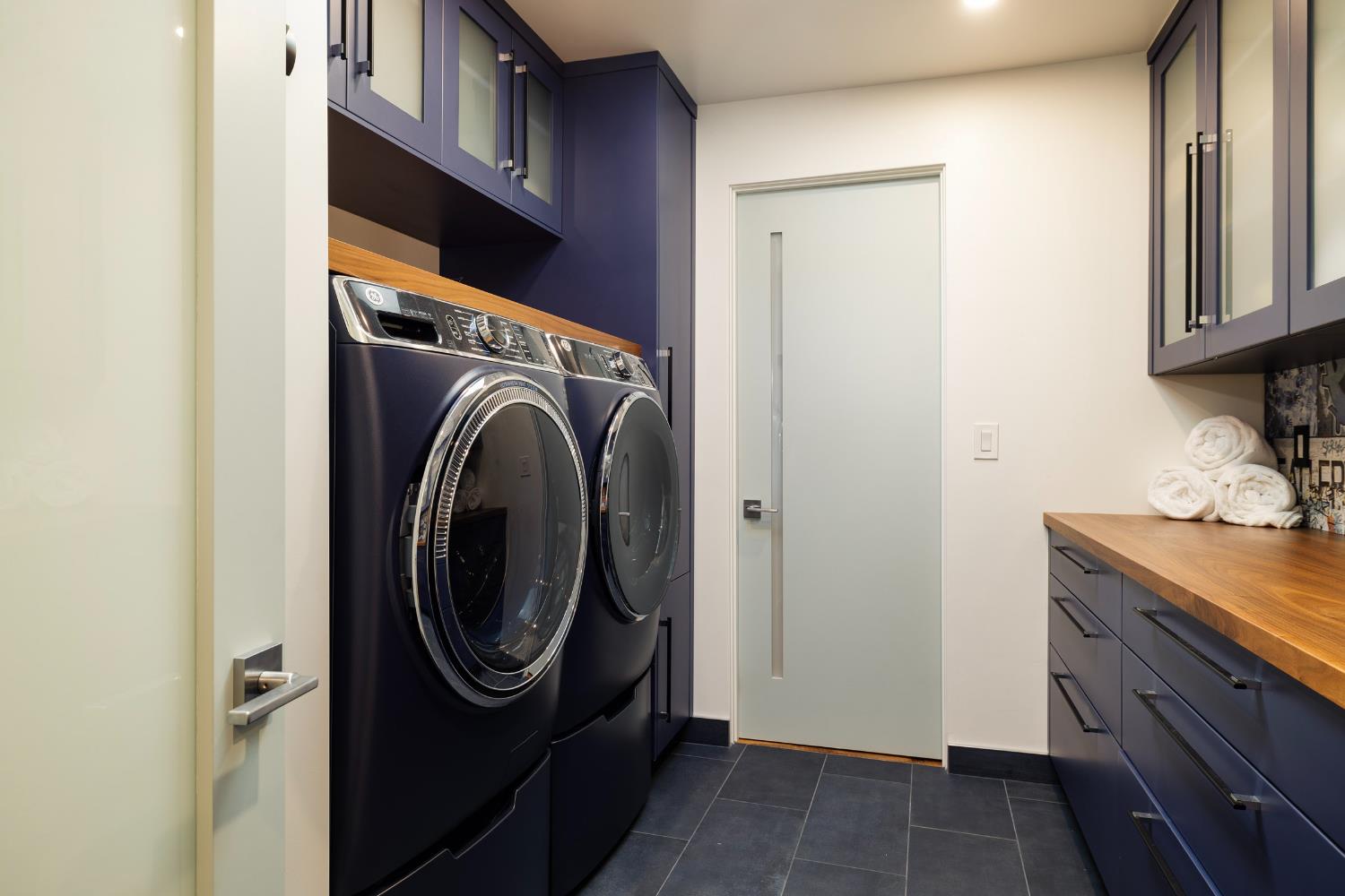 1417 Foothill Road Ojai, CA 93023 - Photo 33 of 41 a utility room with dryer and washer