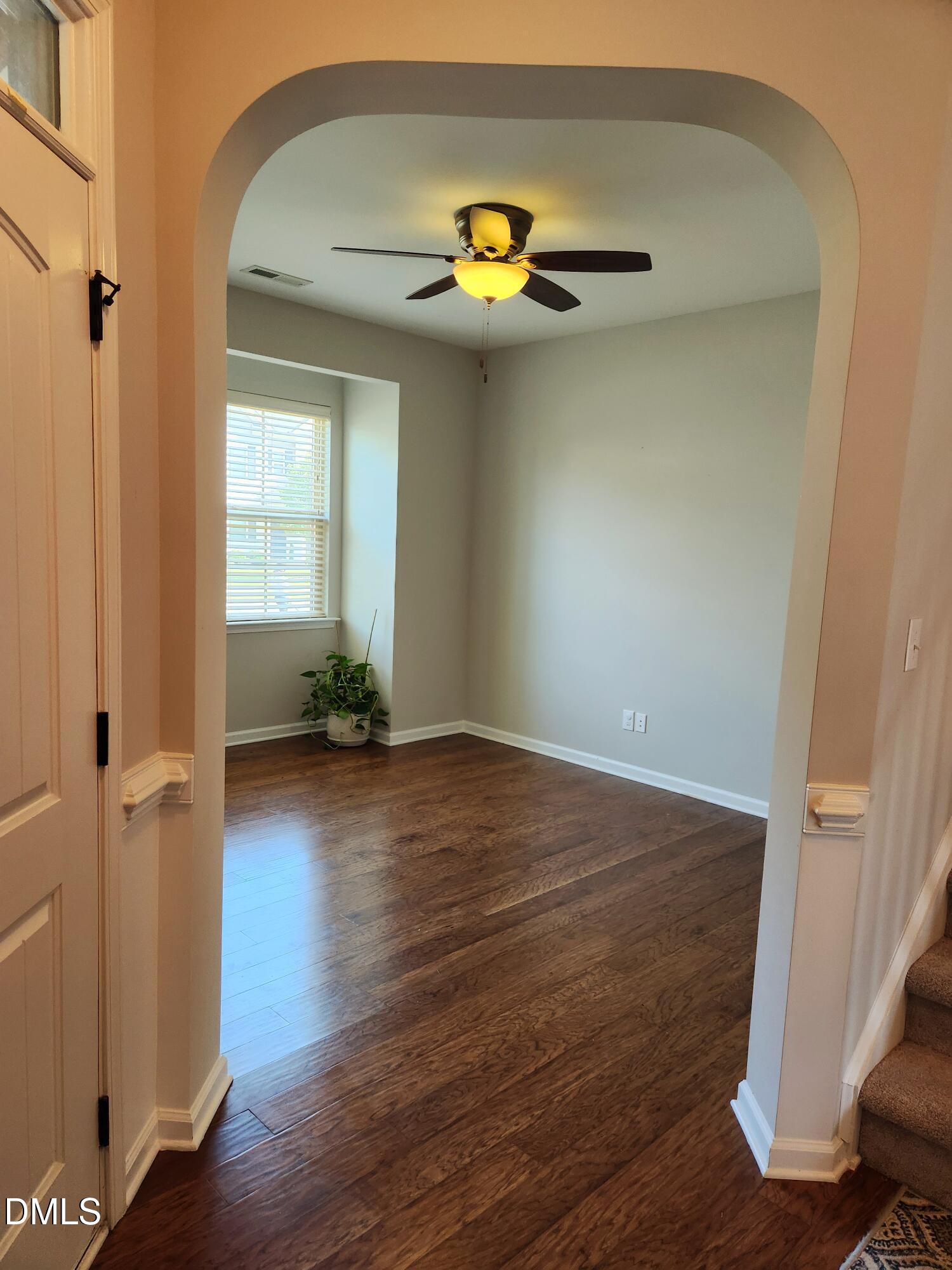 825 Wickham Ridge Road Apex, NC 27539 - Photo 13 of 31 a view of livingroom with wooden floor