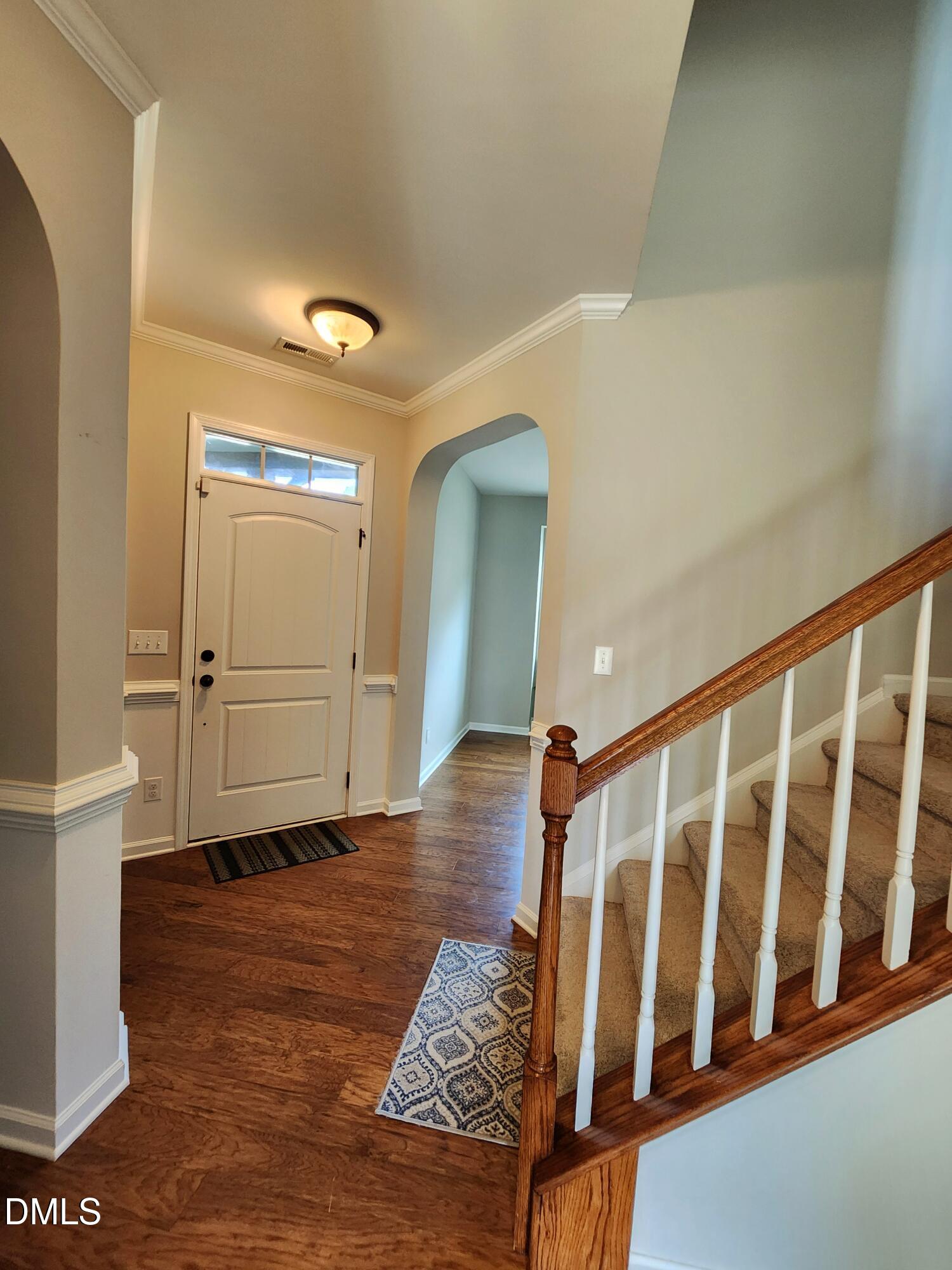 825 Wickham Ridge Road Apex, NC 27539 - Photo 6 of 31 a view of entryway with wooden floor