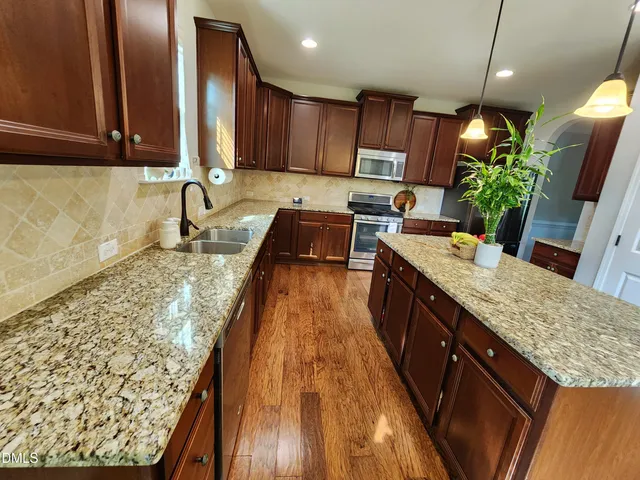 a kitchen with granite countertop lots of counter top space
