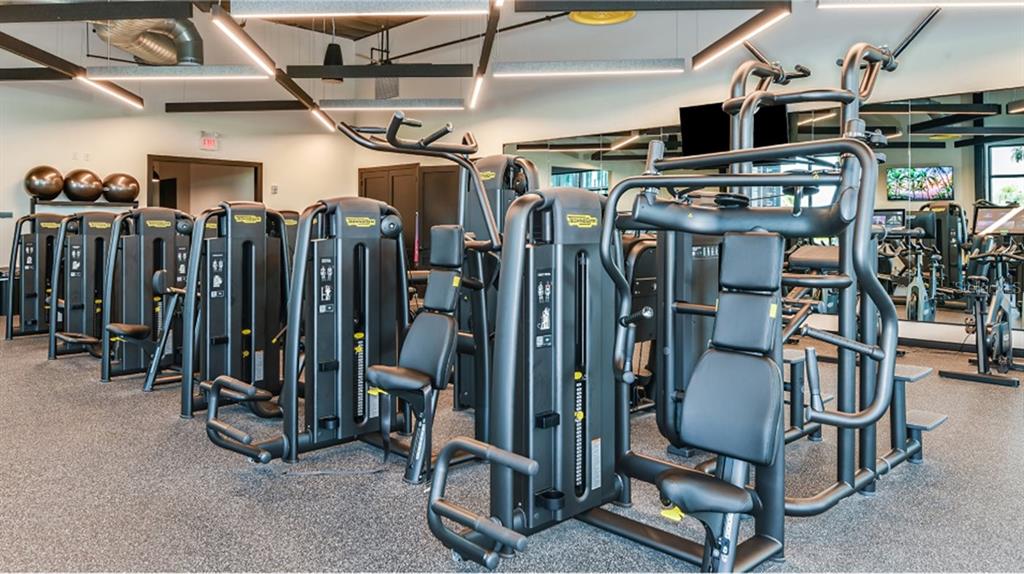 3088 Chromatic Street Kissimmee, FL 34758 - Photo 19 of 21 a view of a room with gym equipment