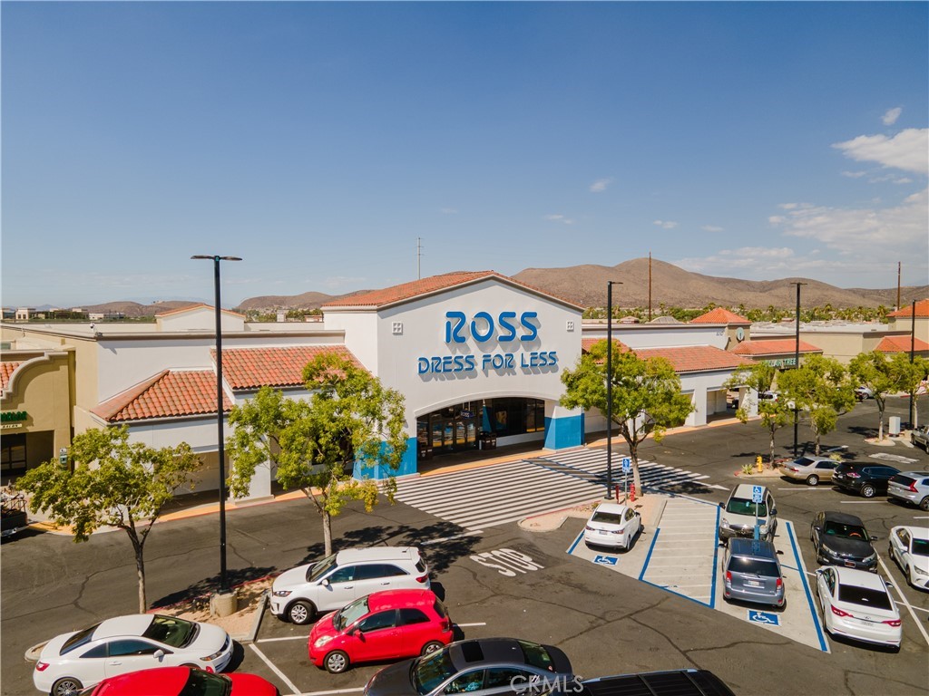 30141 Antelope Road Menifee, CA 92584 - Photo 18 of 47 a view of a patio with couches table and chairs with potted plants
