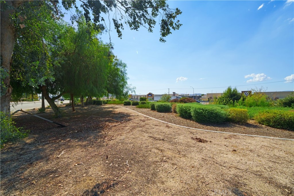 30141 Antelope Road Menifee, CA 92584 - Photo 9 of 47 a view of a road with a yard