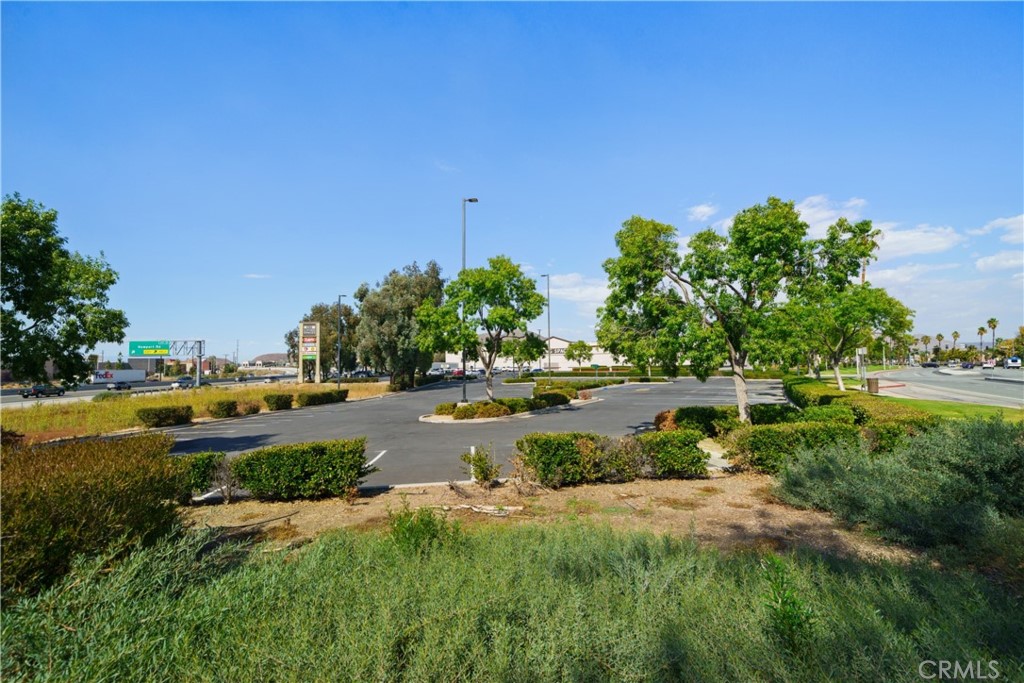 30141 Antelope Road Menifee, CA 92584 - Photo 10 of 47 a view of a lake view with a building in the background