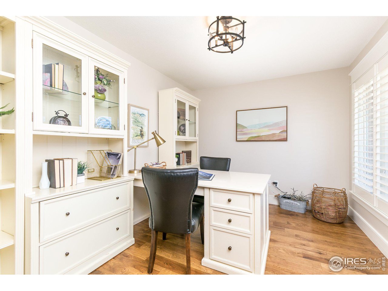 39337 Rangeview Drive Severance, CO 80610 - Photo 16 of 40 a room with a cabinets and a window