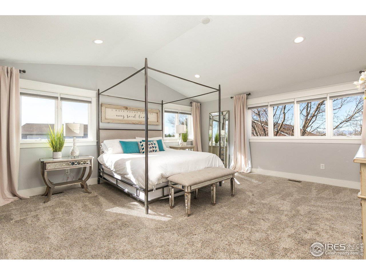 39337 Rangeview Drive Severance, CO 80610 - Photo 17 of 40 a bed room with a bed and a couch