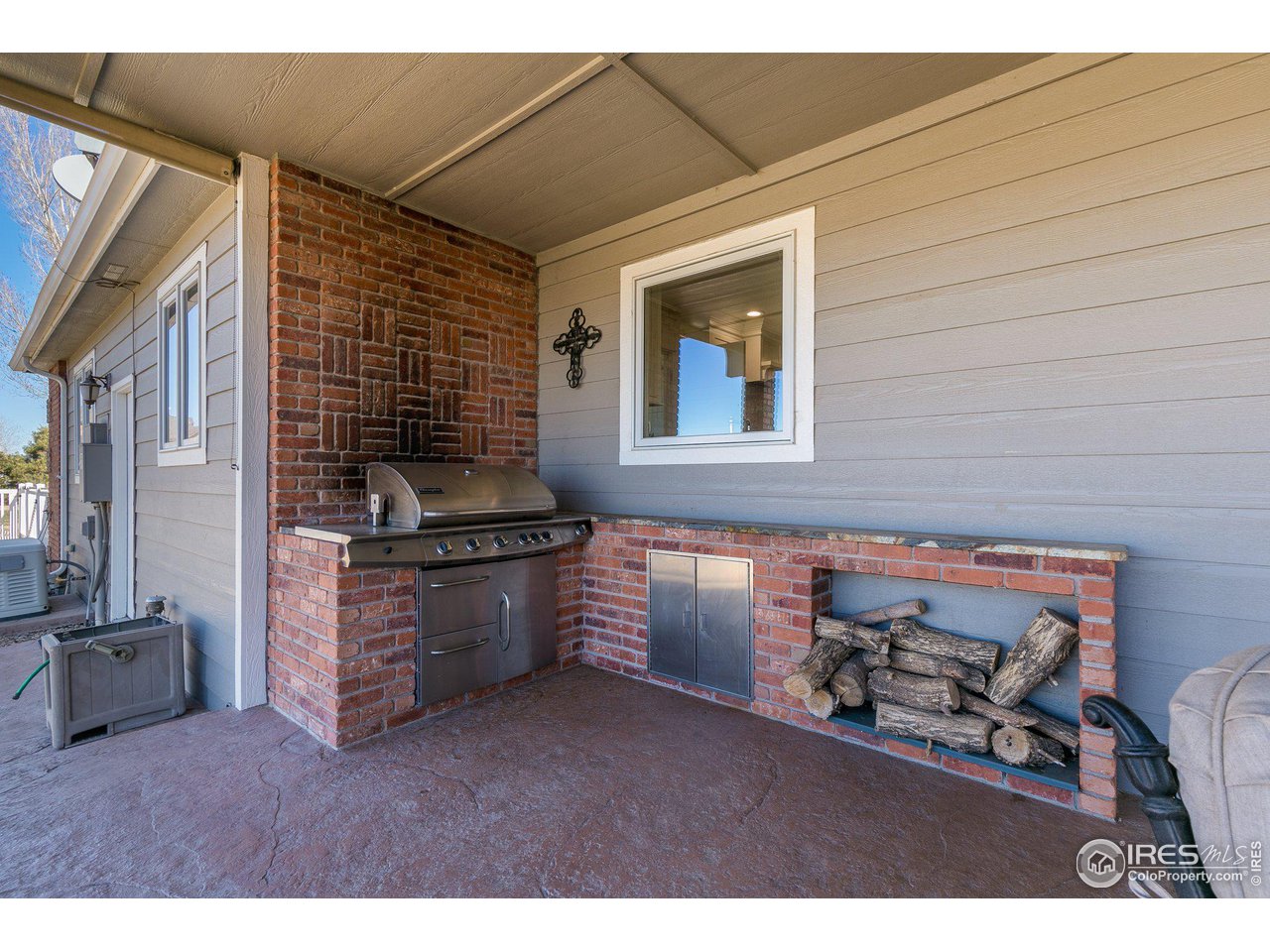 39337 Rangeview Drive Severance, CO 80610 - Photo 31 of 40 a kitchen with stainless steel appliances granite countertop a stove and a sink