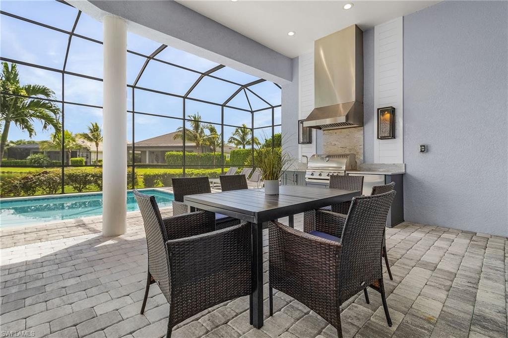 14226 Charthouse Circle Naples, FL 34114 - Photo 14 of 46 a view of a dining room with furniture window and outside view