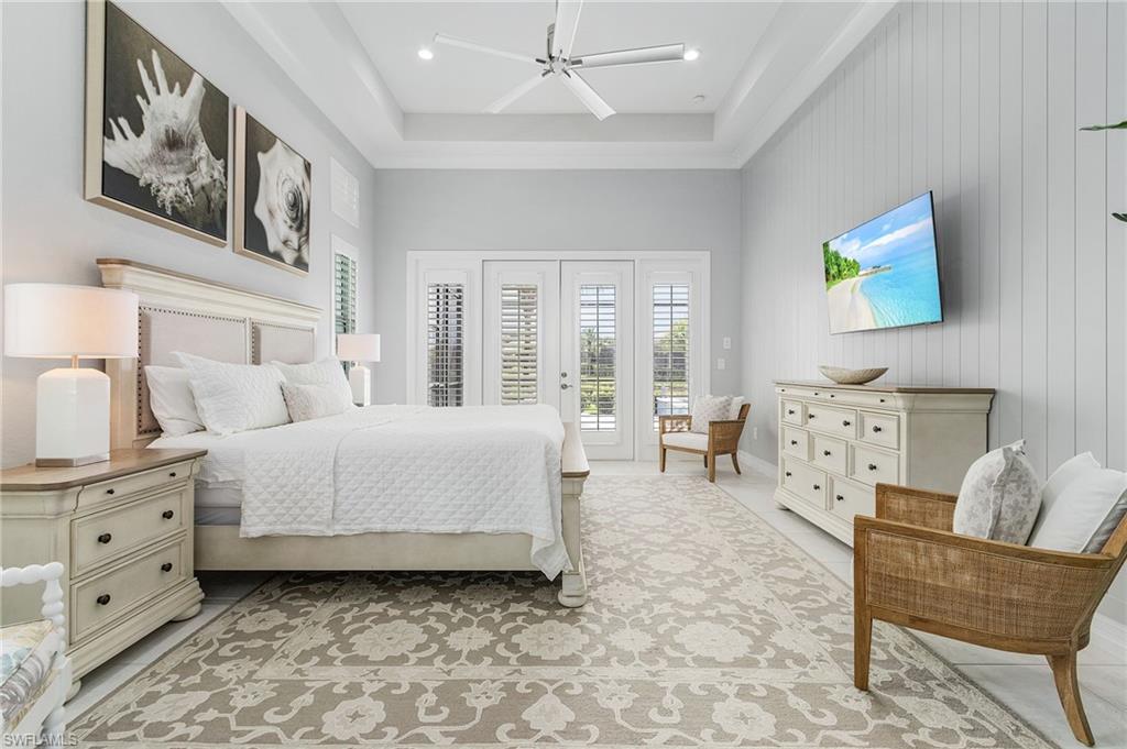 14226 Charthouse Circle Naples, FL 34114 - Photo 33 of 46 a bedroom with furniture and white walls