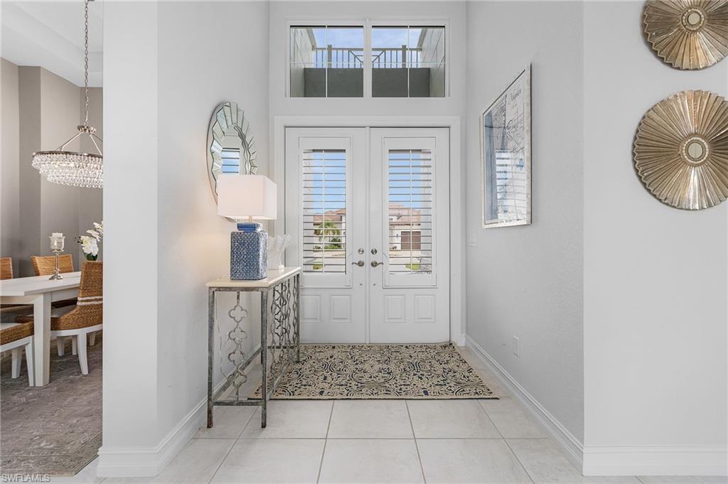 14226 Charthouse Circle Naples, FL 34114 - Photo 37 of 46 a bathroom with a sink and a mirror