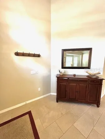 a bathroom with a bathtub and a mirror