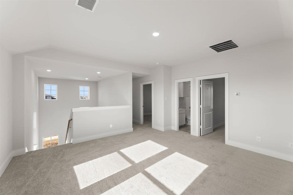 1504 Blackthorne Lane Krum, TX 76249 - Photo 20 of 30 a view of a big room with closet and windows