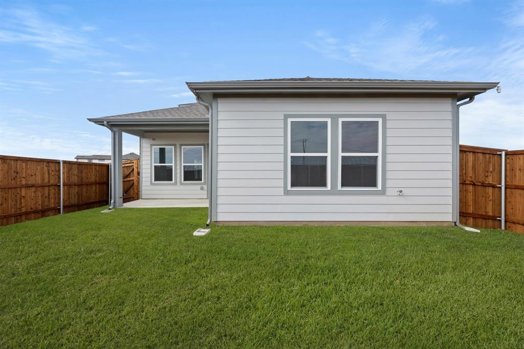 1504 Blackthorne Lane Krum, TX 76249 - Photo 25 of 30 a house view with a garden space