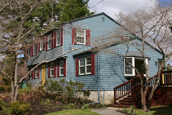 237 Holt Road Andover, MA 01810 - Photo 1 of 27 a front view of a house with garage
