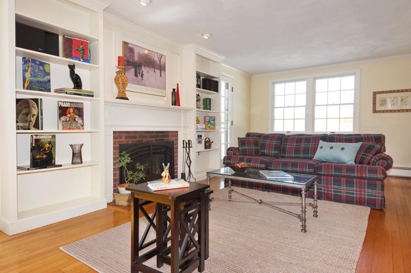 237 Holt Road Andover, MA 01810 - Photo 11 of 27 a living room with furniture and a fireplace