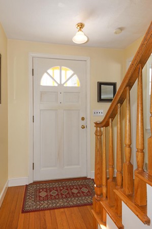 237 Holt Road Andover, MA 01810 - Photo 13 of 27 a view of an entryway with wooden floor and staircase