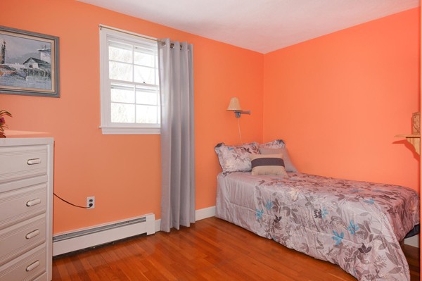 237 Holt Road Andover, MA 01810 - Photo 16 of 27 a bedroom with a bed and a window