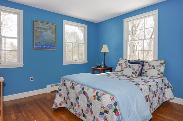 237 Holt Road Andover, MA 01810 - Photo 17 of 27 a bedroom with a bed and a window