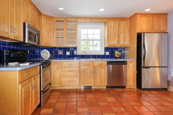 237 Holt Road Andover, MA 01810 - Photo 7 of 27 a kitchen with granite countertop a refrigerator a stove a sink and dishwasher