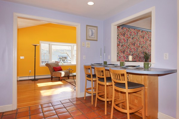 237 Holt Road Andover, MA 01810 - Photo 8 of 27 a dining room with a table and chairs next to a window
