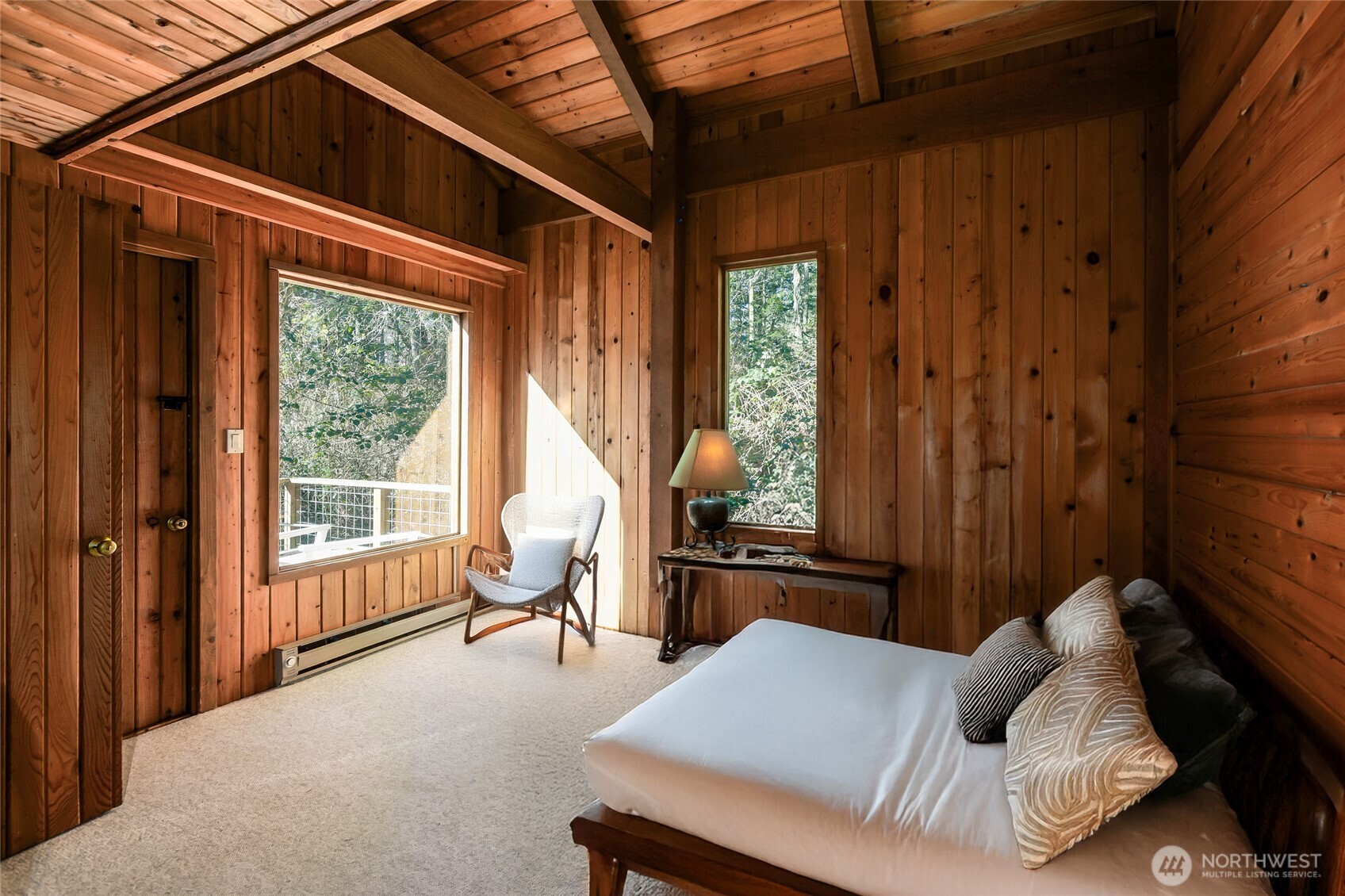 128 White Point Road Friday Harbor, WA 98250 - Photo 14 of 40 a living room with furniture and a window
