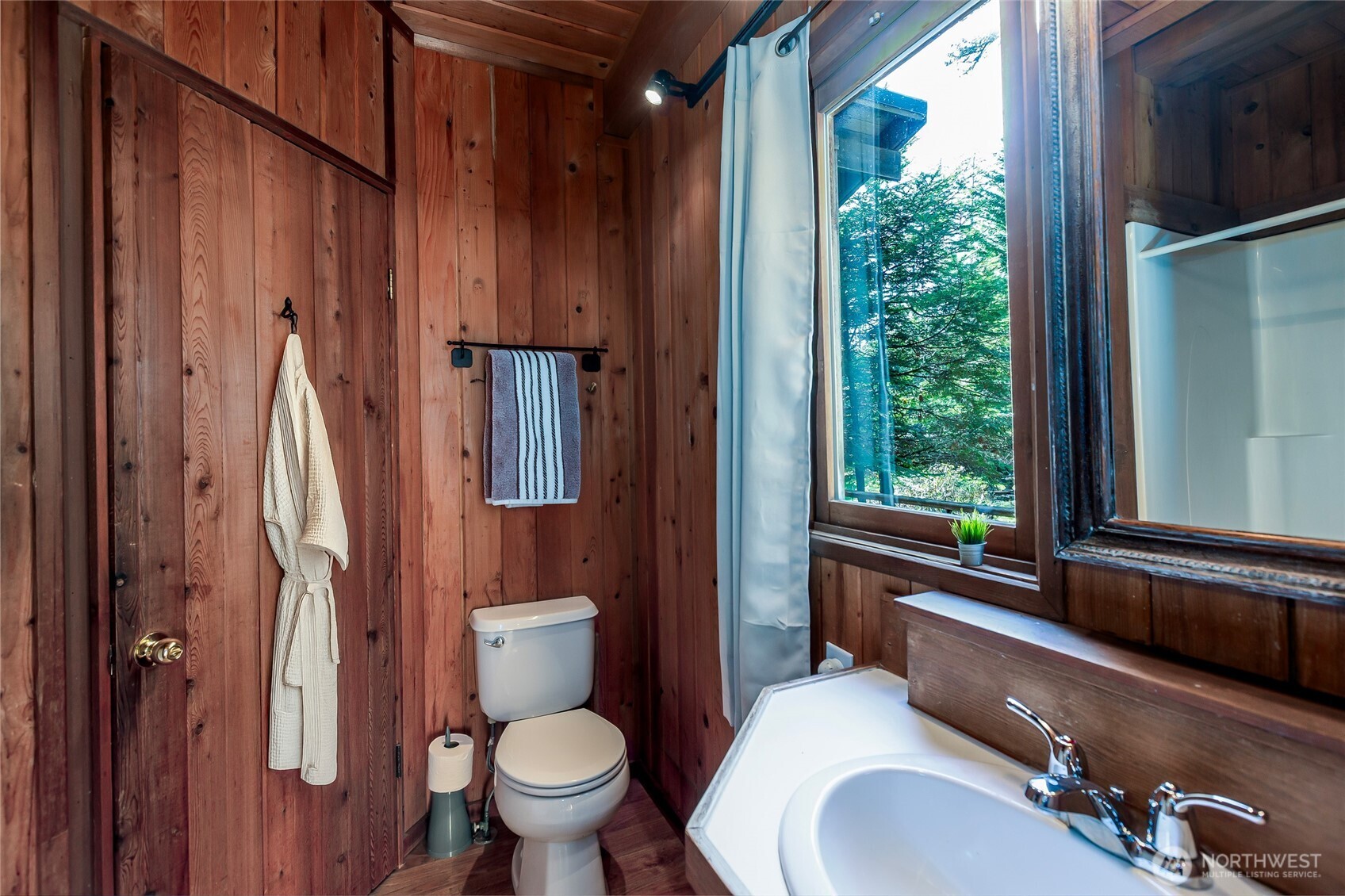 128 White Point Road Friday Harbor, WA 98250 - Photo 16 of 40 a bathroom with a sink toilet and shower
