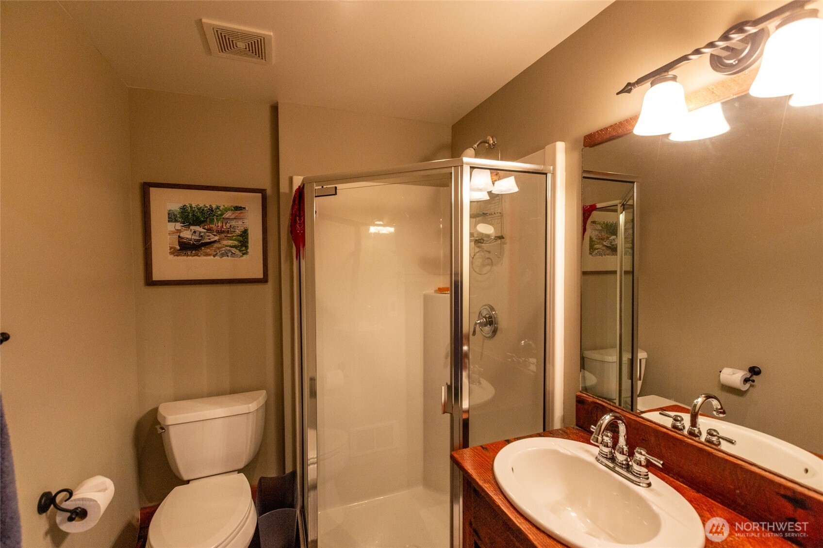 128 White Point Road Friday Harbor, WA 98250 - Photo 33 of 40 a bathroom with a toilet a sink and mirror