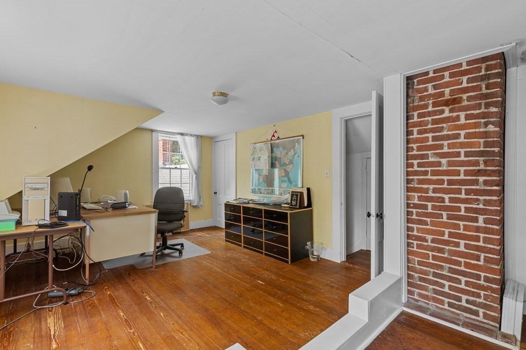 913 Salem End Road Framingham, MA 01702 - Photo 35 of 42 a bedroom with a workspace