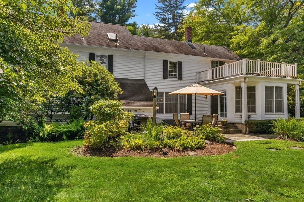 913 Salem End Road Framingham, MA 01702 - Photo 39 of 42 a front view of a house with a yard