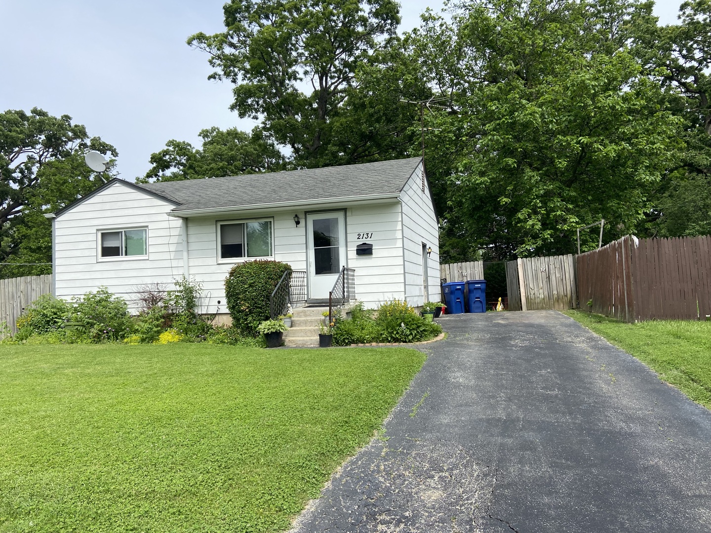 2131 Delaware Road Waukegan, IL 60087 - Photo 1 of 1 a view of a house with a yard and garage