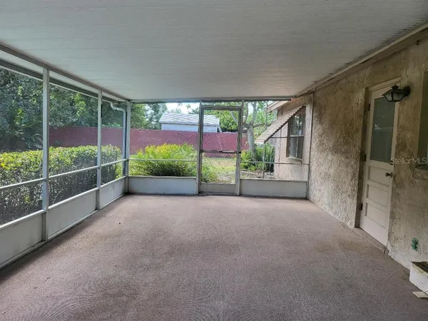 a view of porch and garden