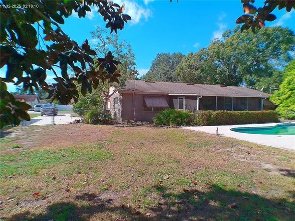 a view of house with outdoor space and street view