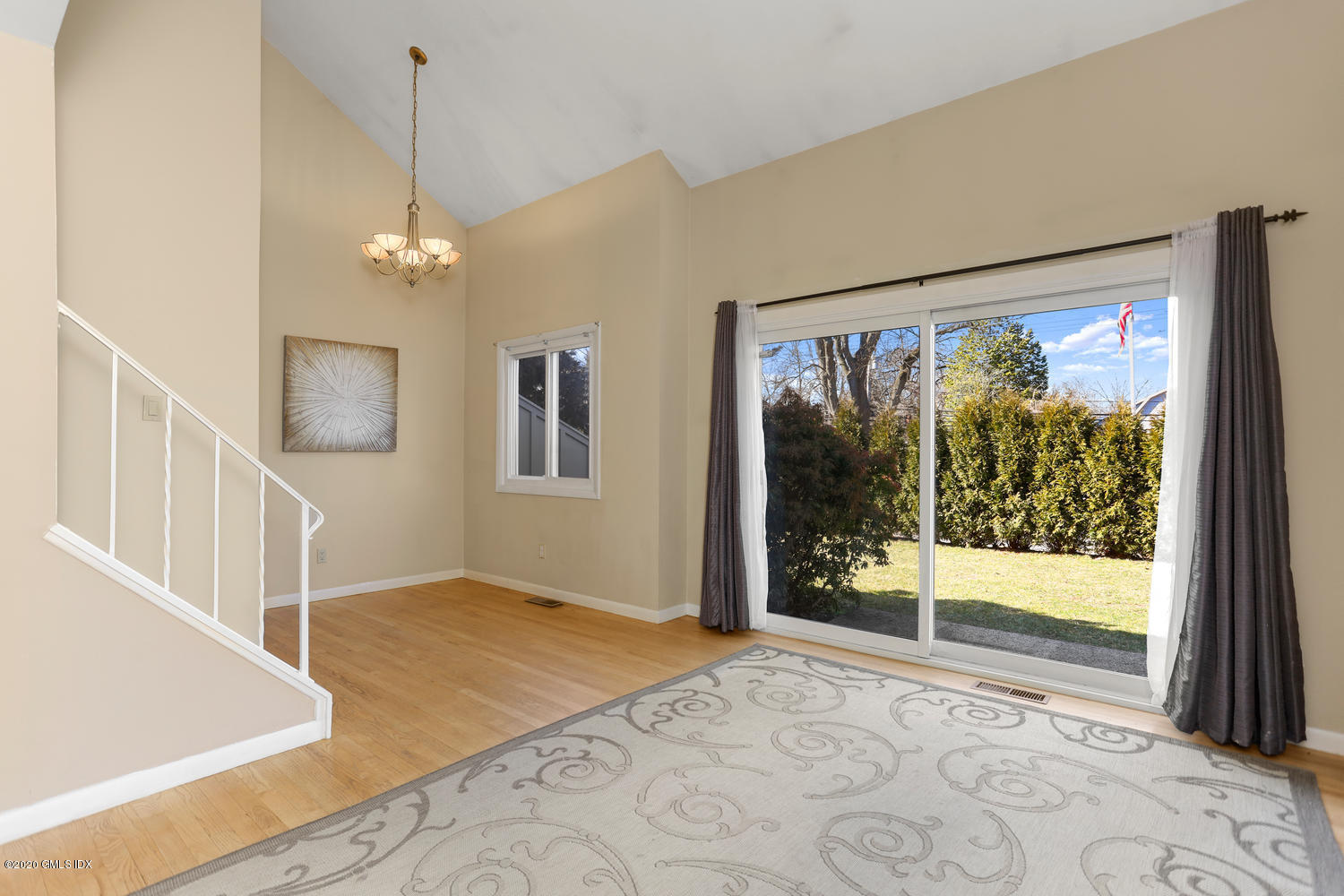 19 Whiffletree Way, Unit 19 Riverside, CT 06878 - Photo 4 of 32 a view of a big room with large windows