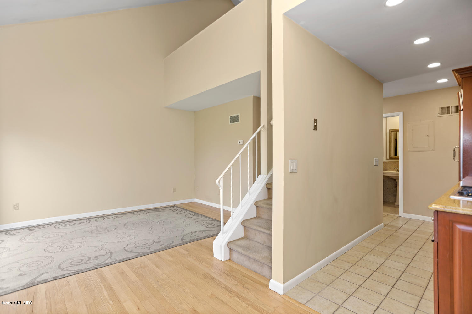 19 Whiffletree Way, Unit 19 Riverside, CT 06878 - Photo 7 of 32 a view of entryway with wooden floor