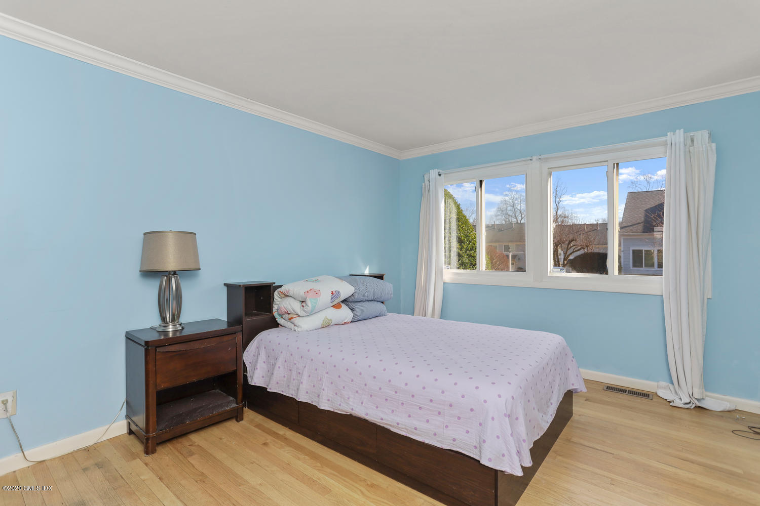 19 Whiffletree Way, Unit 19 Riverside, CT 06878 - Photo 10 of 32 a bedroom with a bed and a window