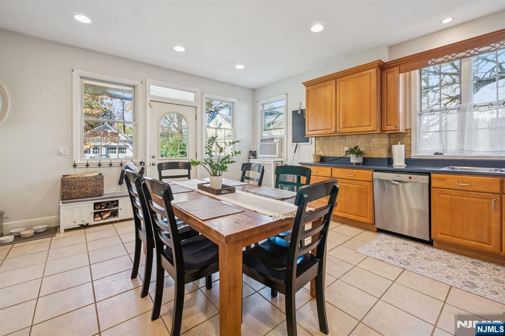 258 Ridgewood Avenue Glen Ridge, NJ 07028 - Photo 15 of 44 a view of a dining room with furniture window and outside view