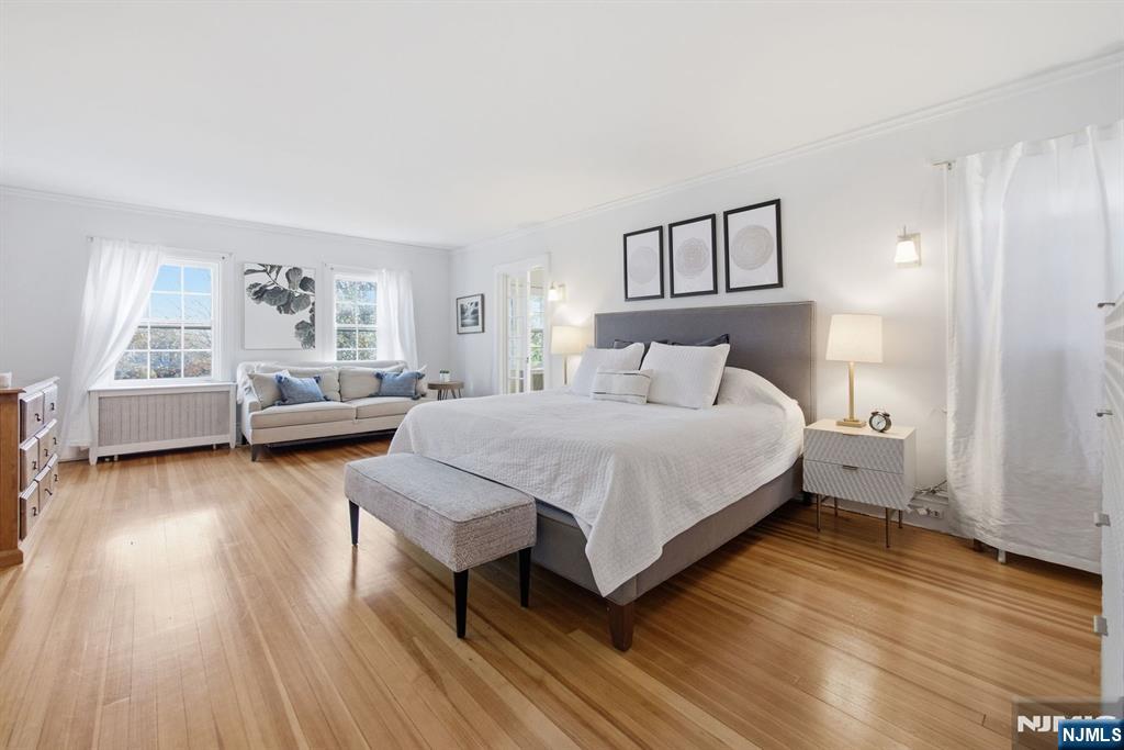 258 Ridgewood Avenue Glen Ridge, NJ 07028 - Photo 20 of 44 a bedroom with a bed and window