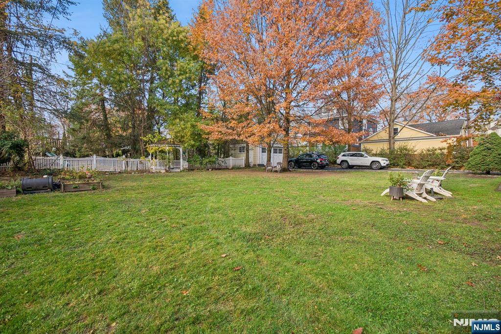 258 Ridgewood Avenue Glen Ridge, NJ 07028 - Photo 36 of 44 a view of a field with large trees