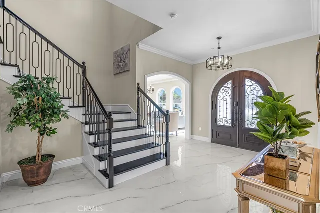 a view of entryway with a flower pot and a potted plant