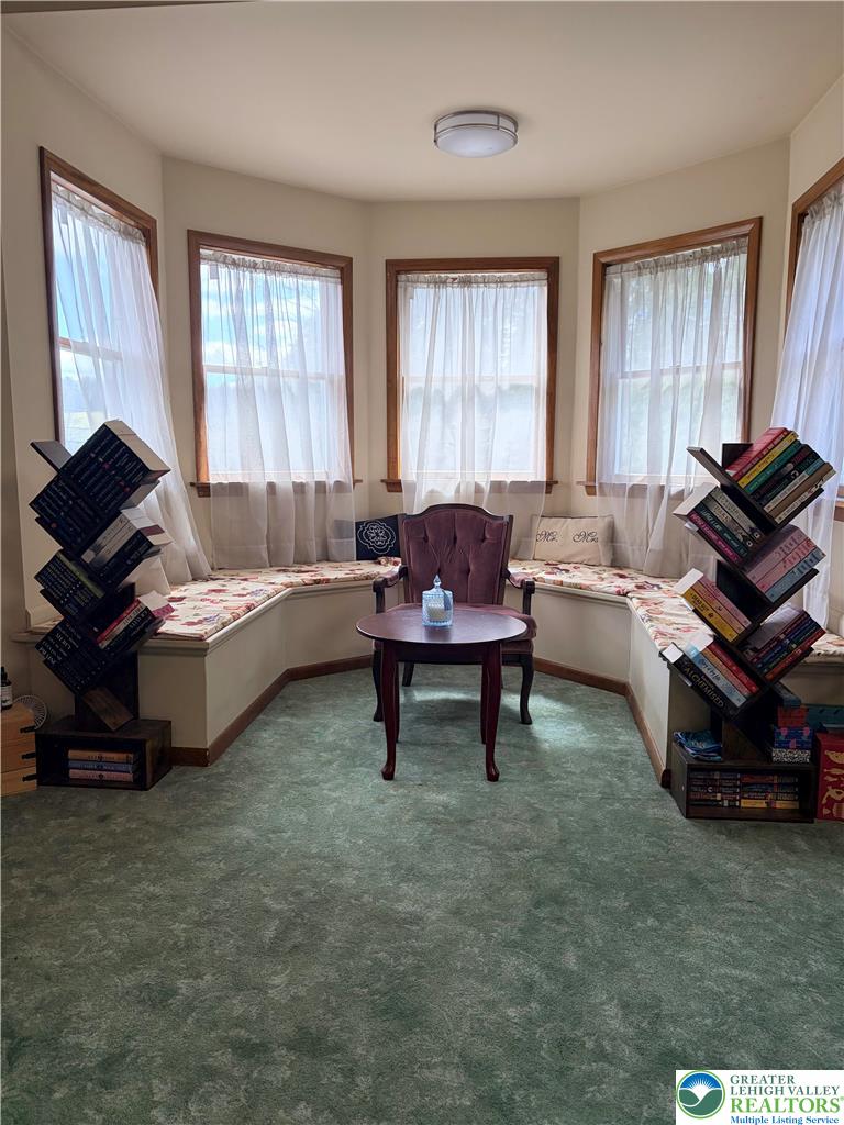 100 Hazelwood Road Lehighton, PA 18235 - Photo 23 of 31 a living room with furniture and a window
