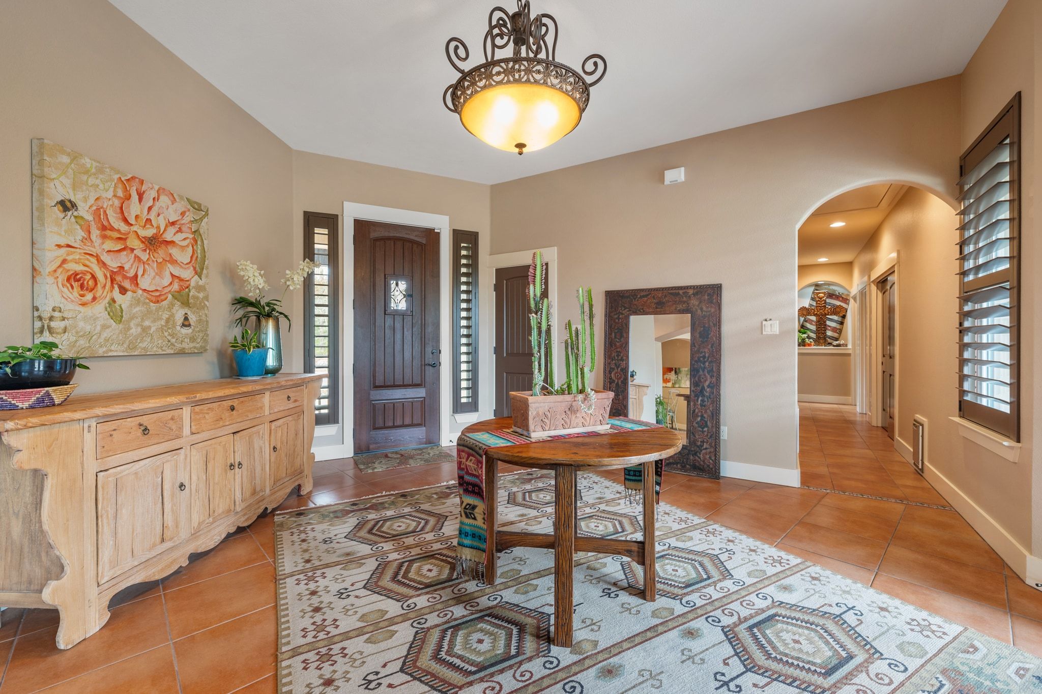 129 Painted Post Bastrop, TX 78602 - Photo 11 of 40 Inside a grand entry foyer greets you with tall ceilings and gorgeous Saltillo tile flooring.
