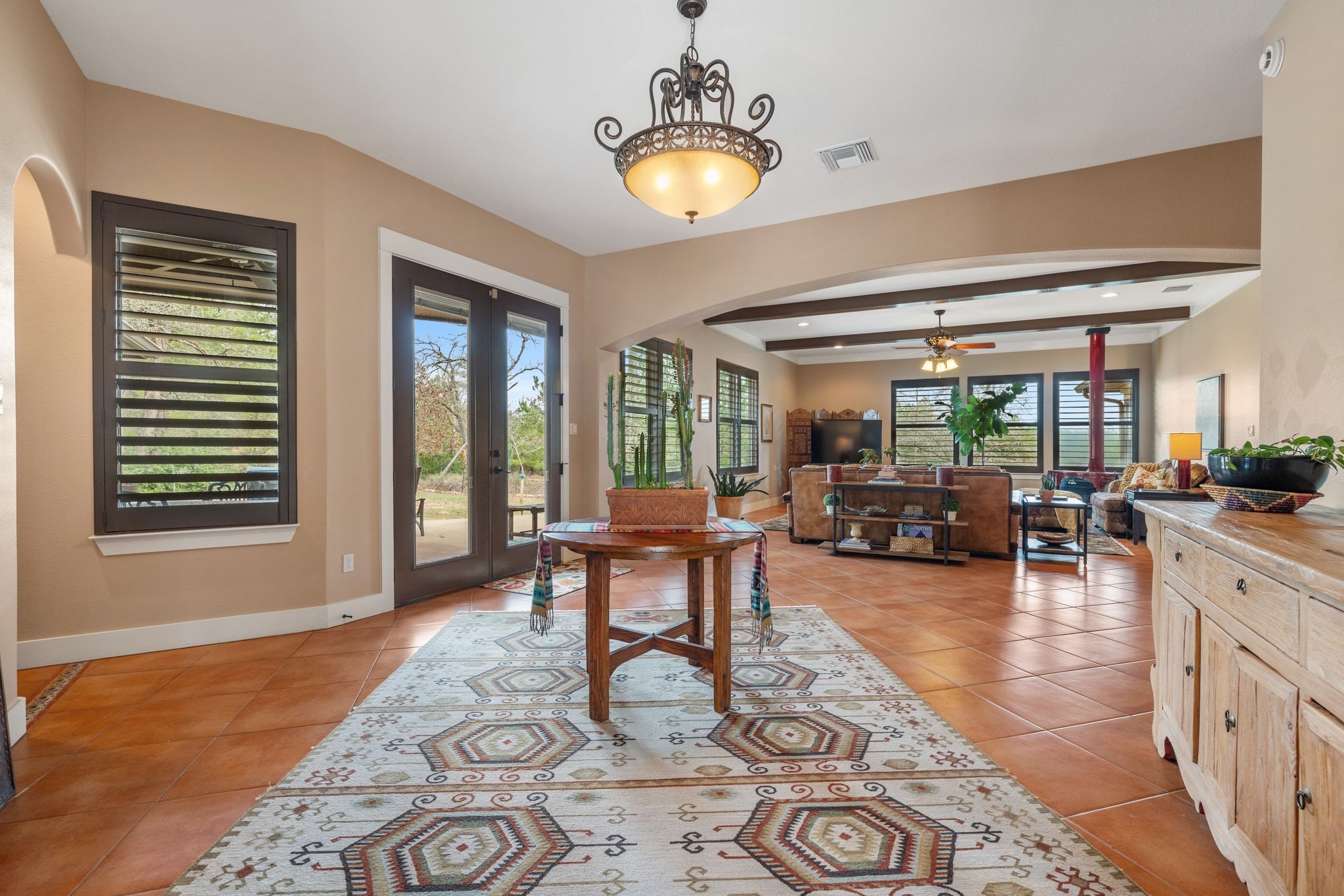 129 Painted Post Bastrop, TX 78602 - Photo 12 of 40 Sweeping archways open the foyer to the main living area and formal dining room.