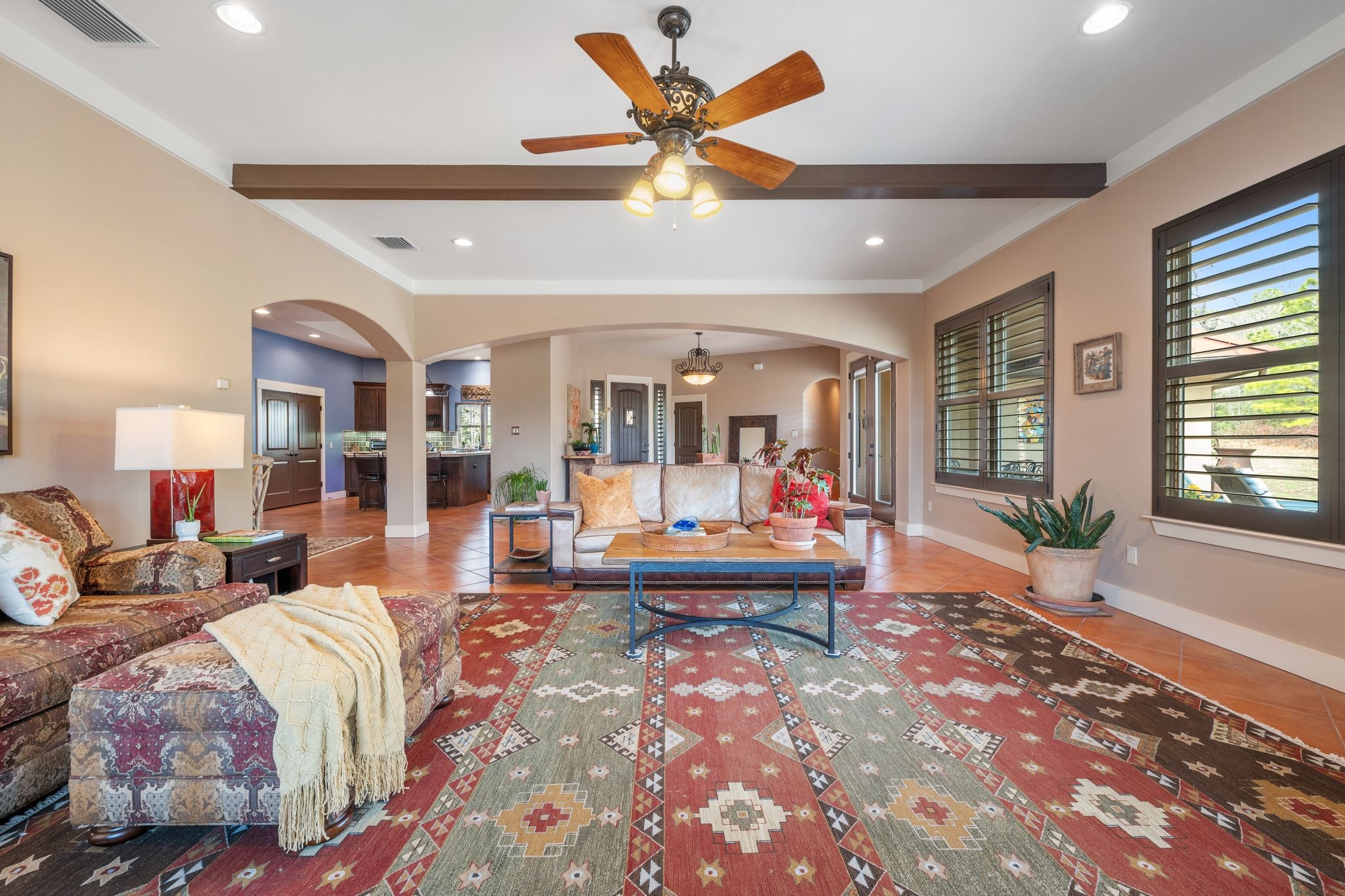 129 Painted Post Bastrop, TX 78602 - Photo 15 of 40 The living room opens to the formal dining room and kitchen for seamless connectivity while also maintaining a desirable separation of spaces.