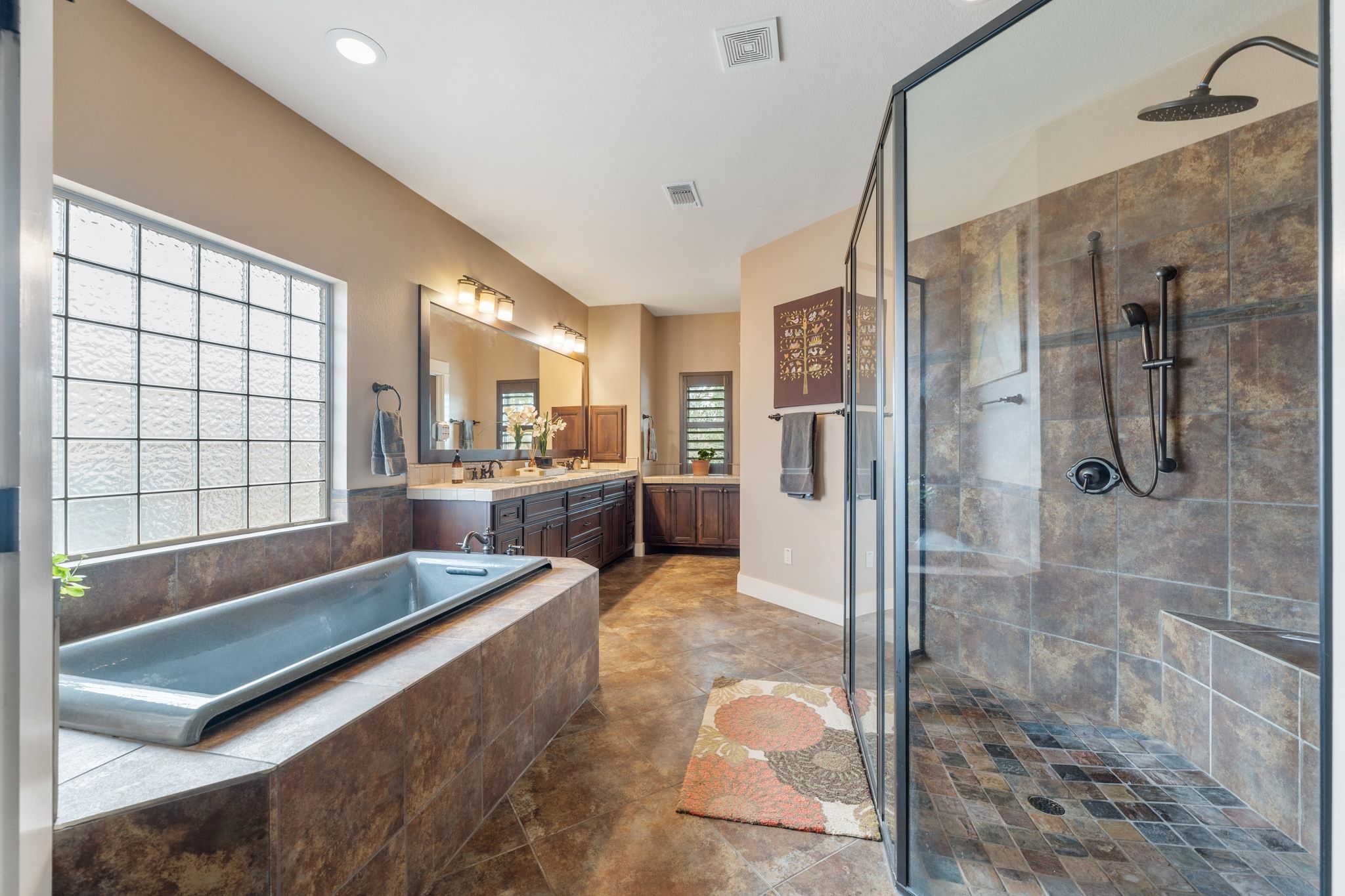129 Painted Post Bastrop, TX 78602 - Photo 23 of 40 The primary ensuite bath is a spa-inspired retreat with a deluxe built-in soaking tub.