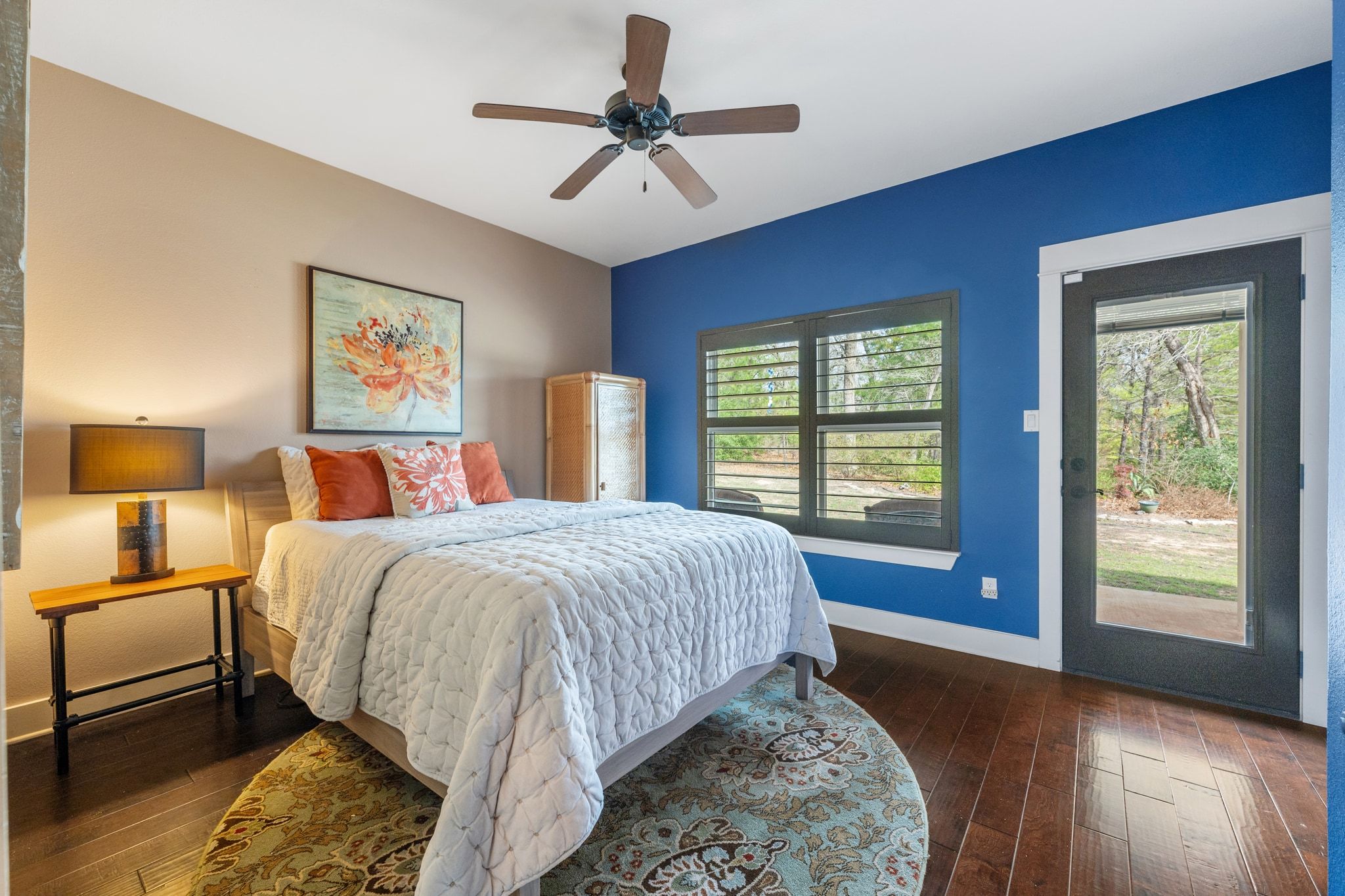 129 Painted Post Bastrop, TX 78602 - Photo 26 of 40 One of three additional bedrooms, this room comes with walk-out access to a private patio and its own ensuite bath.