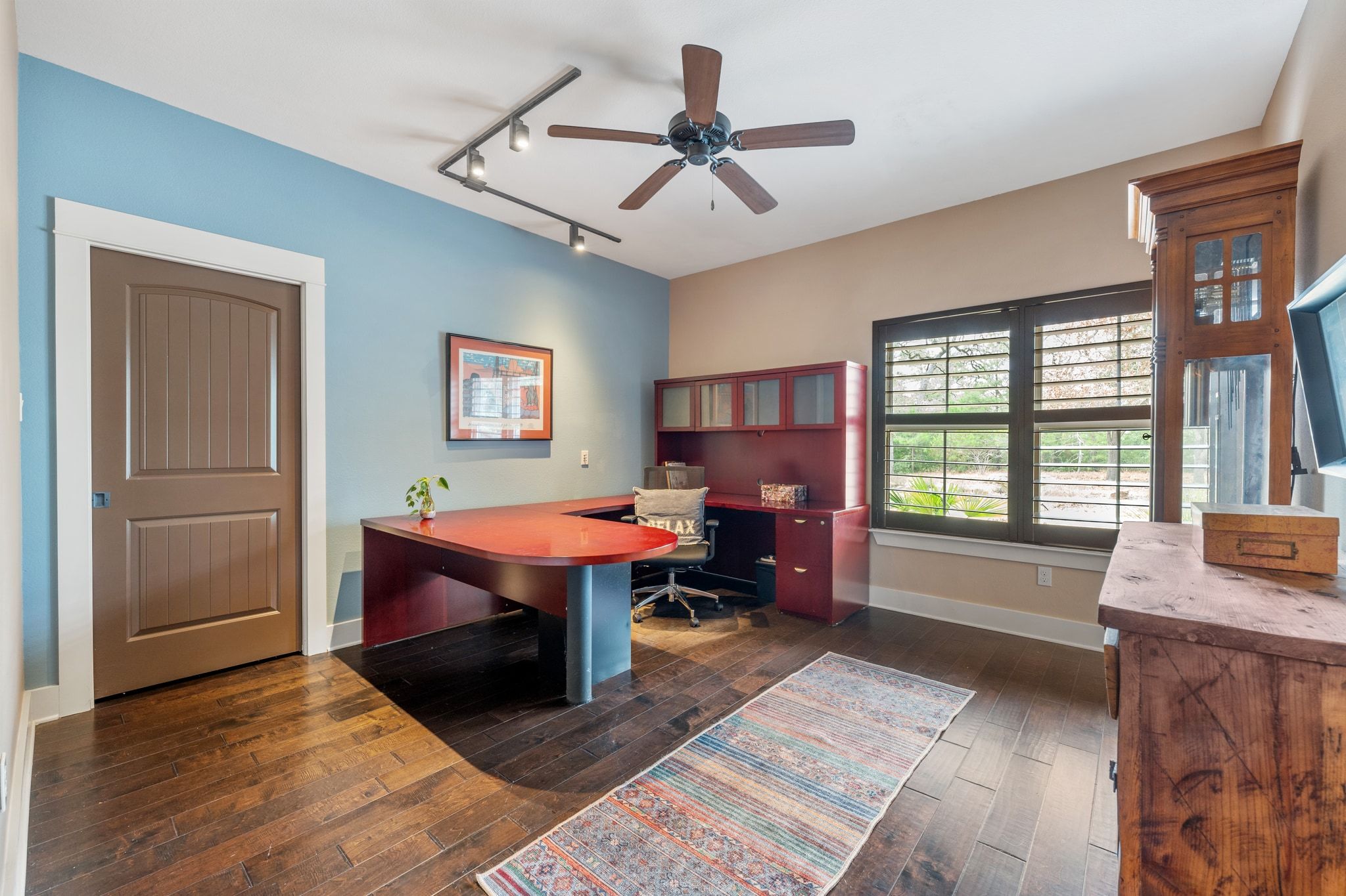 129 Painted Post Bastrop, TX 78602 - Photo 28 of 40 Two additional bedrooms share a full guest bath and come with generous windows and closet storage.