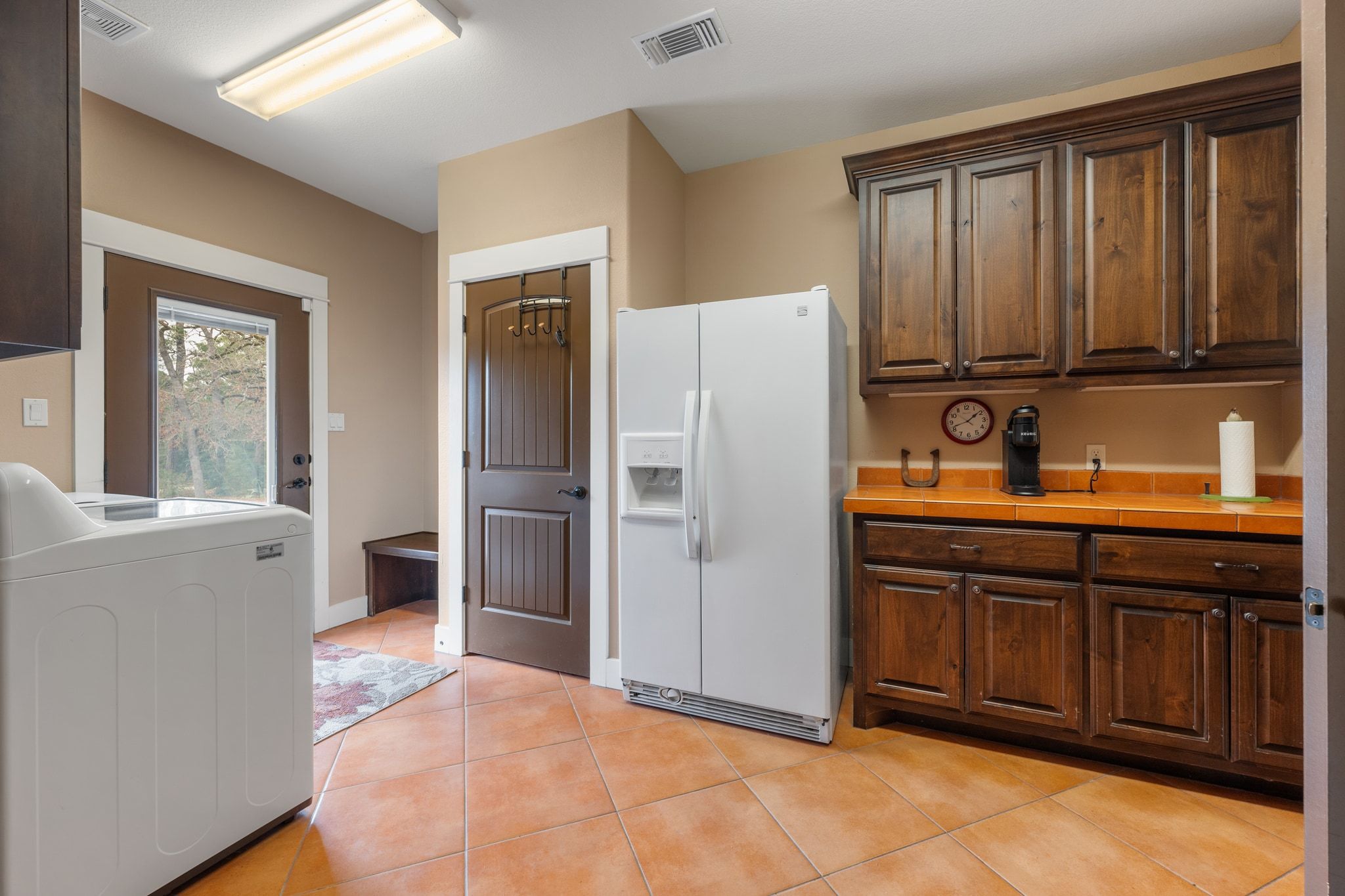 129 Painted Post Bastrop, TX 78602 - Photo 33 of 40 a kitchen with granite countertop a refrigerator and a sink