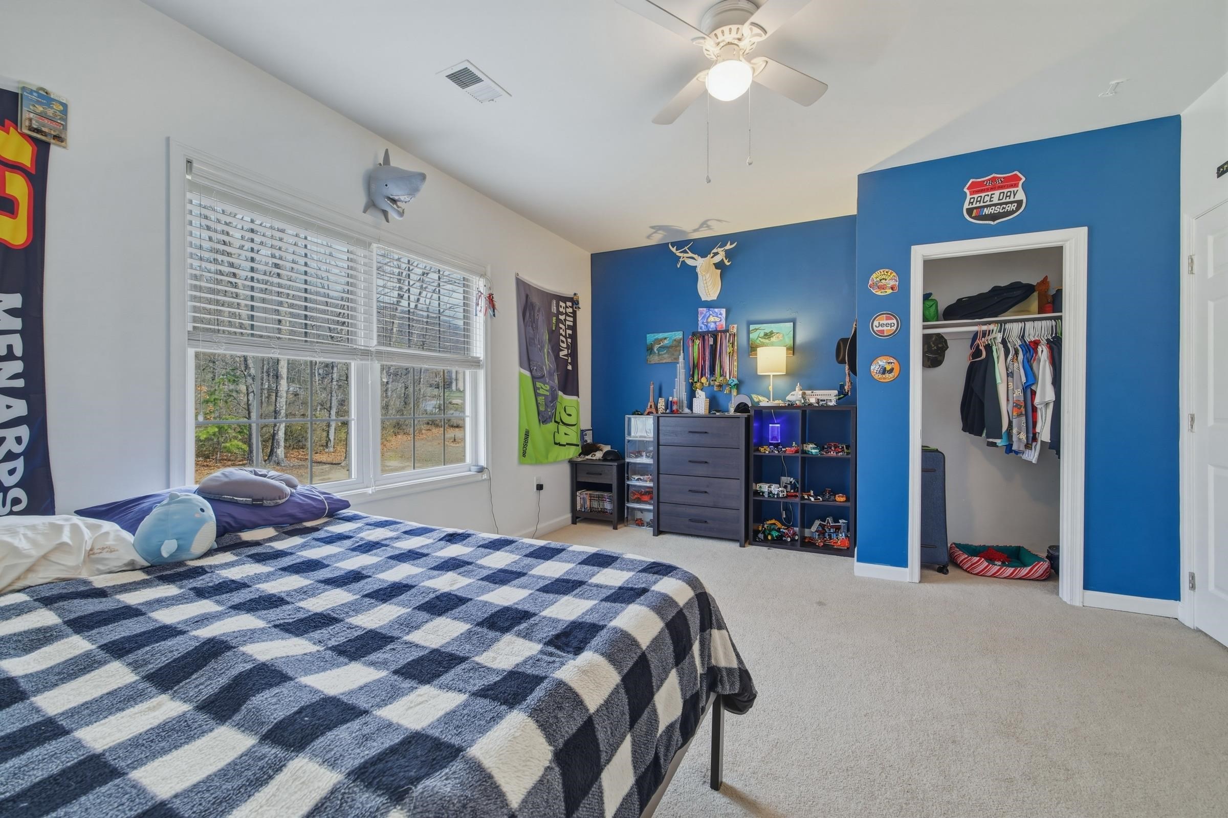 257 Hunter Road Maurertown, VA 22644 - Photo 30 of 61 a bedroom with a bed and a large window