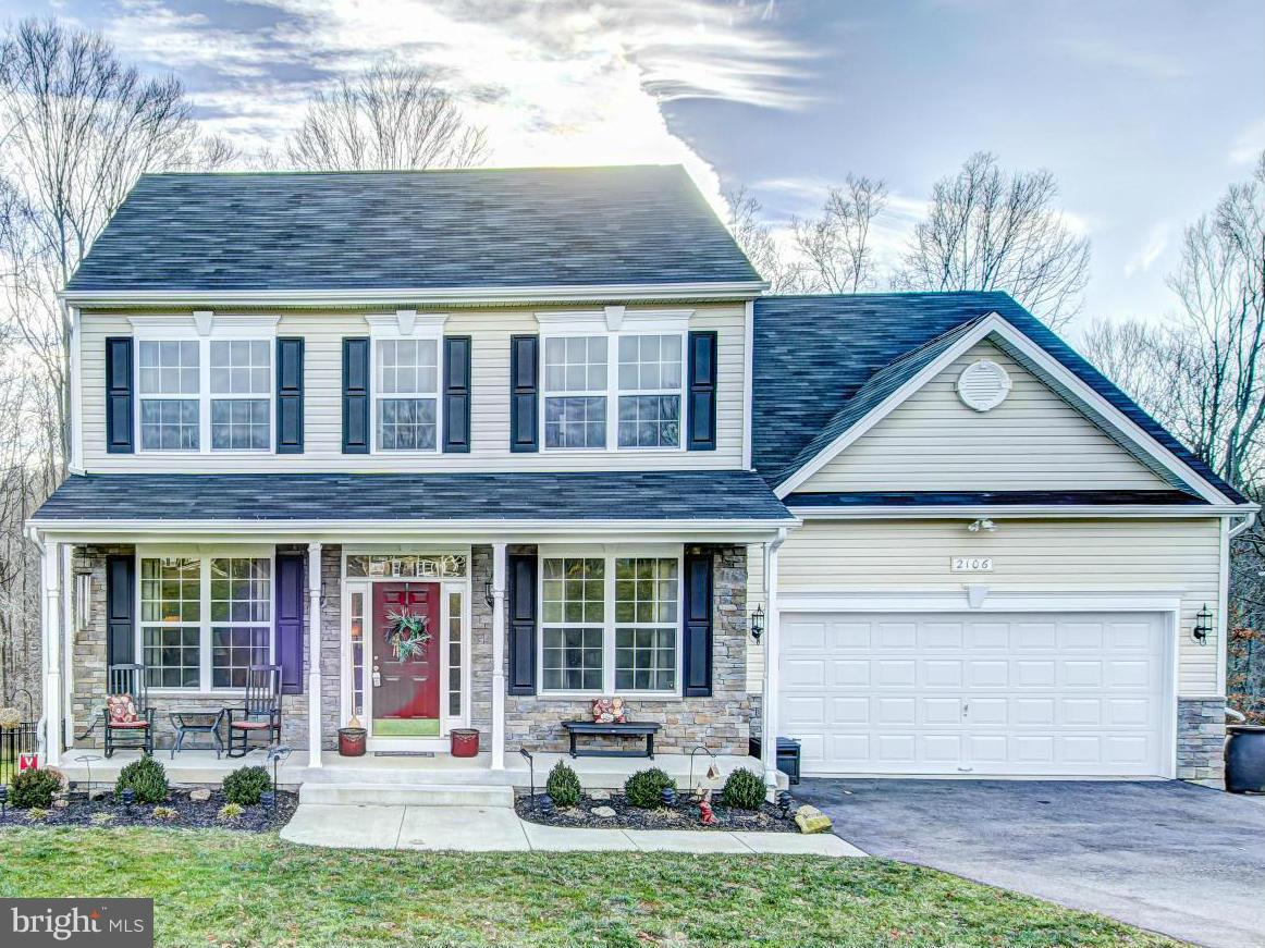 2106 Baythorne Road Prince Frederick, MD 20678 - Photo 1 of 30 front view of a house with a yard