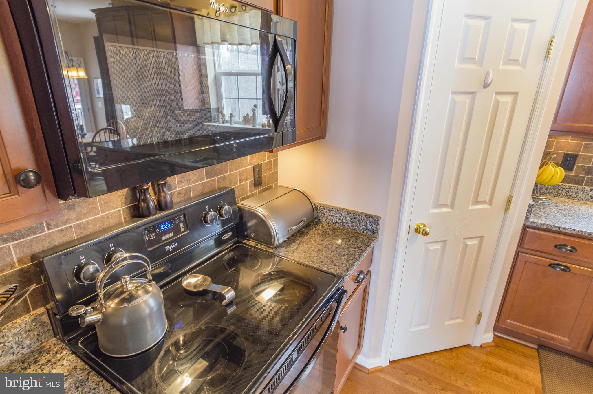 2106 Baythorne Road Prince Frederick, MD 20678 - Photo 13 of 30 a bathroom with a mirror